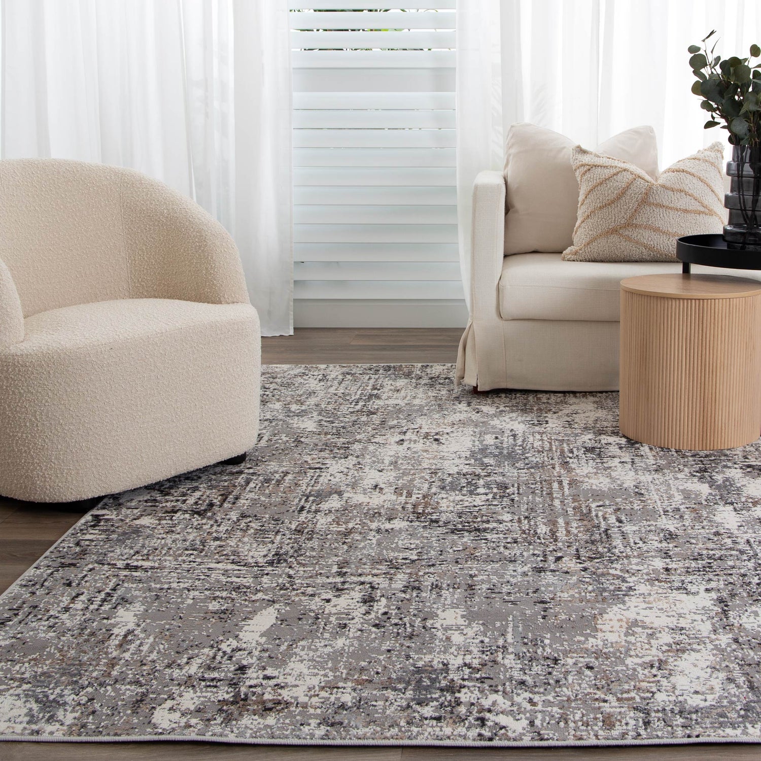 Charlotte Collection: Modern synthetic rug in a bold abstract design with pops of color.