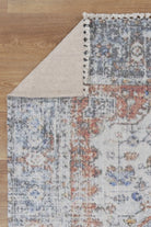 Agora Classic Blue & Terracotta Wool Rug folded corner photo