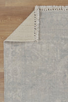 Agora Souk Ivory Wool Rug folded corner photo